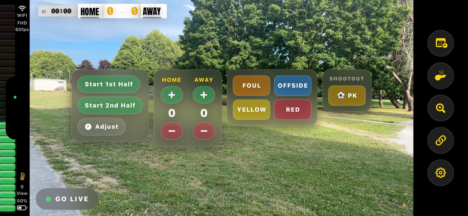 A team mobbing their goal scorer in celebration, live scoreboard overlaid on the stream